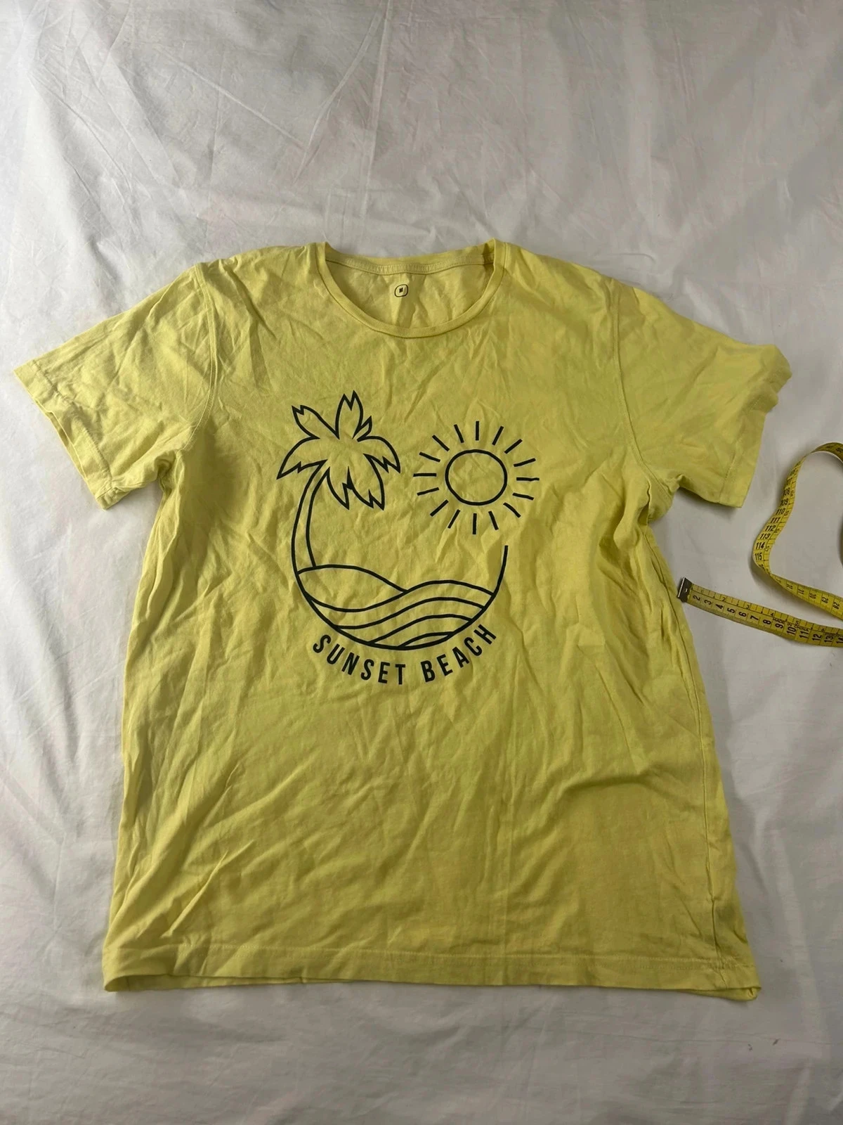 T-shirt jaune à motifs bleu sunset beach